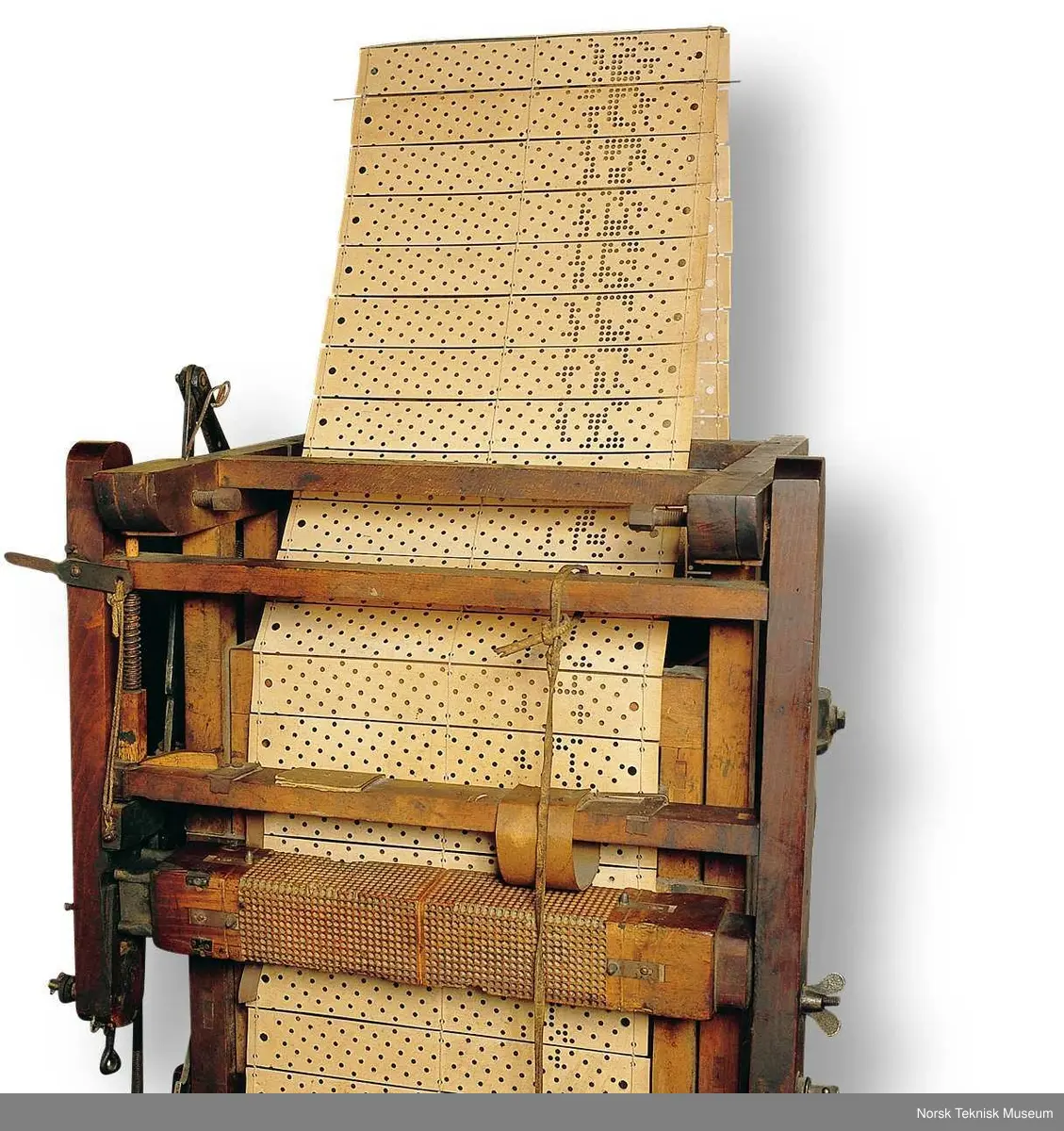 Jacquard mekanismen består av kroker, nåler med spialfjærer og et prisme (kortvalse) med tilhørende hullkort bundet sammen i en remse. Hullkortene ledes (rundt) prismet som har en frem- og tilbake bevegelse. For hvert innslag i veven behøves et Jacquard- hullkort. (Der hullkortet har et hull går renningen ned- der det ikke er et hull går renningen opp). Hver gang prismet beveger seg til siden, tar en hake fatt i hjørnet på prismet og vrir den 1/4 omdreining, slik at et nytt kort vendes mot nålesoissene for å bestemme hvilke kroker som skal heves ved neste innslag. Elektronisk styrte Jacquard vevstoler for industriell produksjon er i dag i bruk over hele verden.