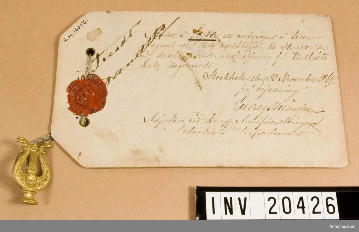 Lyra m/1869 att anbringas på trumslagares och spels axelklaffar. Hallands och Västgöta-Dals regementen.