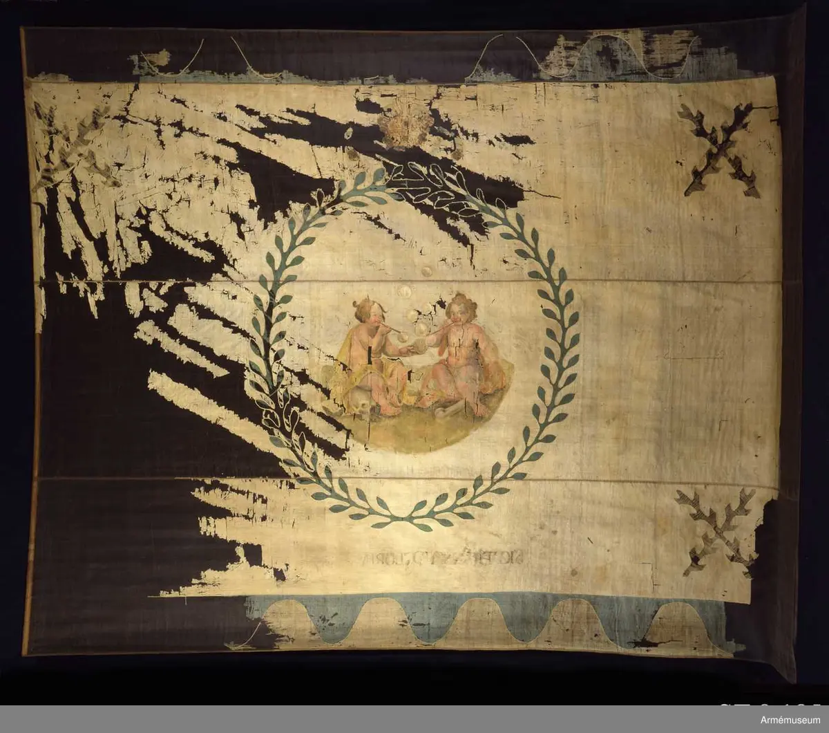 Allegoriskt motiv föreställande två små barn sk. putti som blåser såpbubblor. Motivet omgivet av en lagerkrans och krönt av en kejsarkrona.
Vanitasmotivet (såpbubblor) anspelar på Fredrik V av Pfallz den sk Vinterkungen och dennes kortvariga lycka på den böhmiska tronen.