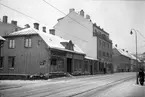 Östra Storgatan i Jönköping med affärer. Bland annat ur-optik, Konst & Inramningsaffär och Möbelhallen.