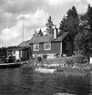 Uppland, Stockholms län, Frötuna skeppslag, Länna socken, Gåsskär. Segelsömmare Örlunds arbetsbod