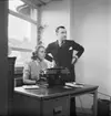 Herrkläder
Man och kvinna vid skrivmaskin