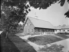 Villa med förskola
Trädgård med lekande barn
Exteriör