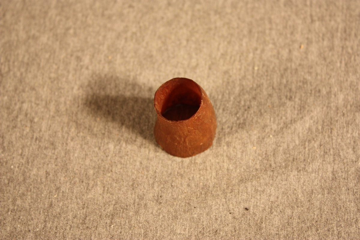 Avskore horn med form som avkutta kjegle.
