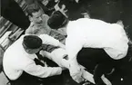 Sjukvårdsövning ombord på kryssaren Göta Lejon, den 26 aug. 1948.