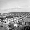 Vy över Anders Knapes väg och Göteborgsvägen, fotografiet taget från berget vid Bohusgården, 1960