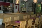 'Del av caféet med disken. ::  :: Fotonr. 7095 består av en bildserie som dokumenterar diverse utrymmen i byggnaden så som kontor, arbetsplatser, arbetsrum, magasin m.m. Bilder tagna före och efter olika ombyggnationer bl.a.'