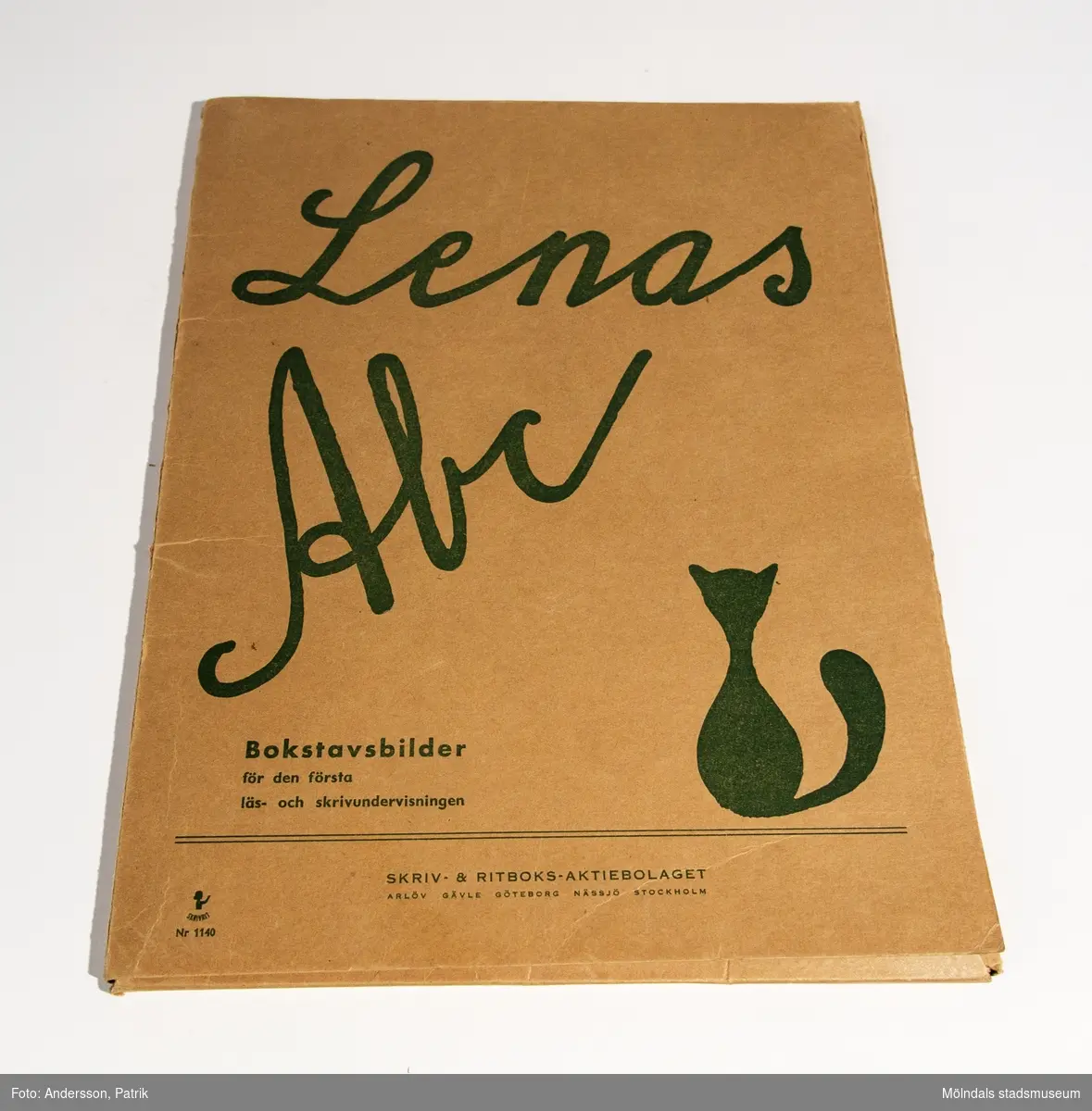 "Lenas ABC", mapp med bilder, bokstaven "H" saknas.