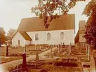 Söderby-Karls kyrka och klockstapeln.
Nr: 473.