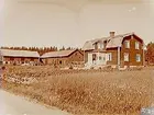 Granmarkens gård, bostadshus och två ekonomibyggnader.
J.G. Eriksson