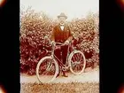 En man med cykel.
Aug. Wennerlund