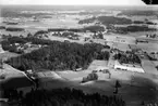 Flygfoto över Glanshammar, bostadshus och byggnader.