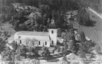 Flygfoto över Ramsbergs kyrka.
Bilden tagen för vykort.