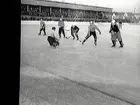 Bandy. ÖSK-AIK, situationsbilder.