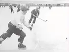 Bandy vid Eyravallen, ÖSK Askersund.
Målvakt Karl-Ivar Ekberg på språng. Han är pappa till Jan-Ivar Ekberg som stod för ÖSK i flera år.
Askersundaren är Hasse Bergsten.