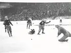 Bandy vid Stockholms stadion. ÖSK-AIK. Situationsbild mot AIK.