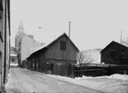 Bostadshus.
Nikolaikyrkan i bakgrunden.