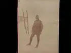 Mars 1920. Snöig man med skidor