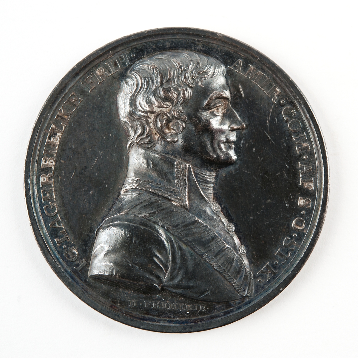 Medalj i silver, präglad för flottans konstruktionskår över amiralen m.m. J. G. Lagerbjelke (1745-1812)
Framsida: Bröstbild av Lagerbjelke
