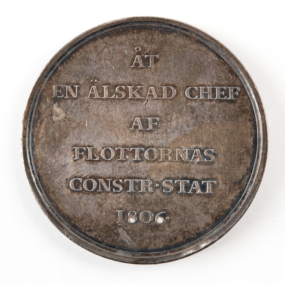 Medalj i silver, präglad för flottans konstruktionskår över amiralen m.m. J. G. Lagerbjelke (1745-1812)
Framsida: Bröstbild av Lagerbjelke