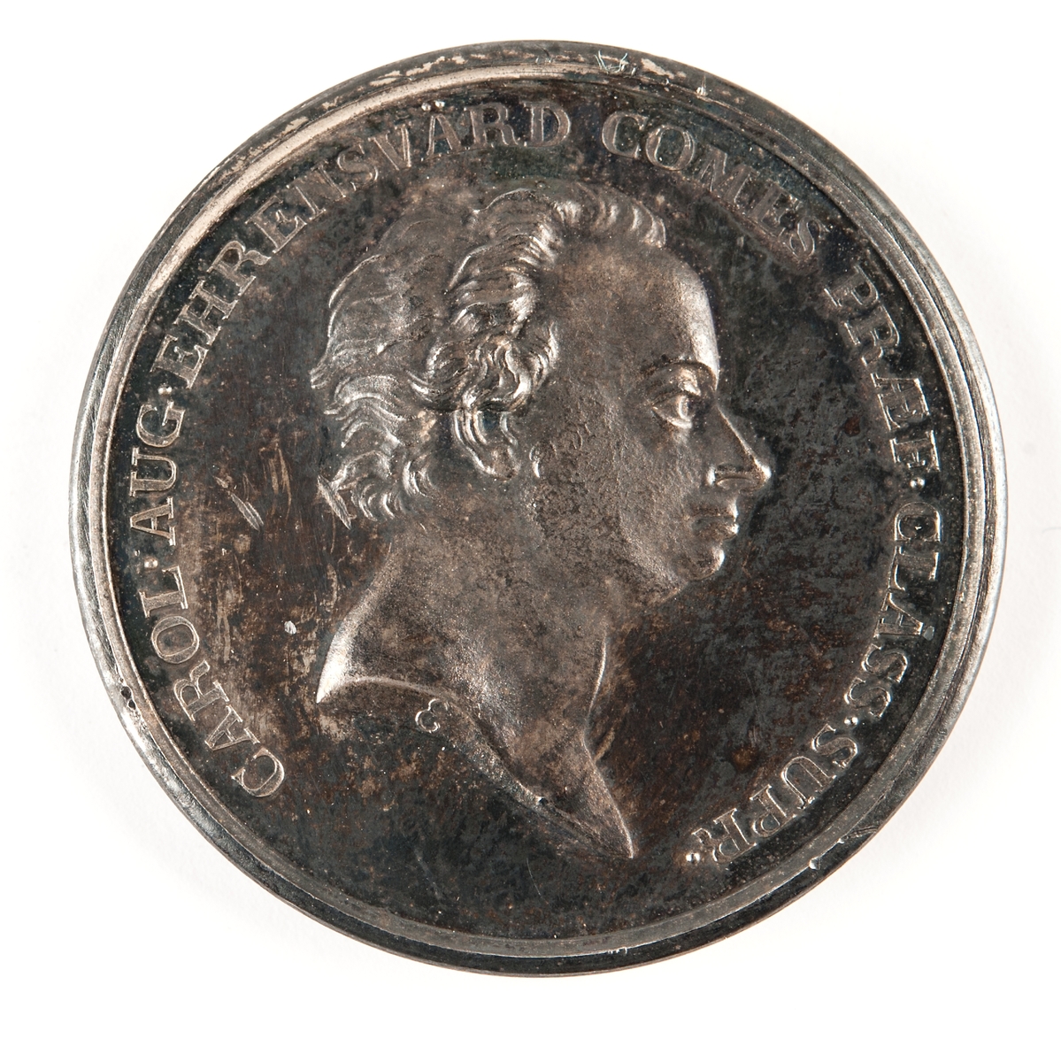 Åtsidan: Porträtt av Ehrensvärd. 
Frånsidan: Orfeus med lyra.