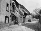 Skioptikonbild med motiv från Rothenburg.
Bilden har förvarats i kartong märkt: Rothenburg VI. 1901. 5