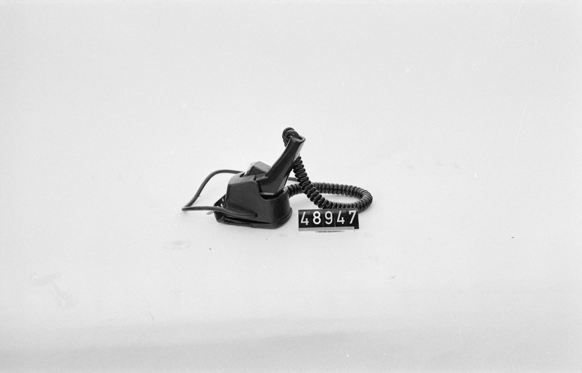 Mikrofon med hållare till AGA Mobilradio.