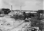 Hofors Jernverk, vy från sydost. Fotografiet är en gåva till säjaren av Göth Odelberg i september 1901 och tillhör en samling av 13 fotografier.