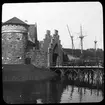 Skioptikonbild med motiv från Allmänna Konst- och Industriutställningen i Stockholm 1897. Gamla Stockholm.