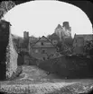 Skioptikonbild med motiv från Oberwesel med kyrkan i bakgrunden.
Bilden har förvarats i kartong märkt: Resan 1904. Oberwesel III