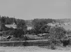 Överums bruk, då ännu masugnen fanns kvar. Det vita huset i mitten är brukskontoret.