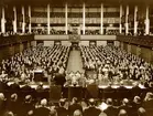 Världskraftkonferensens öppnande i Stockholms konserthus i maj 1933. Kommerserådet Axel F. Enström i talarstolen.