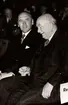 Stadsminister Albin Hanson i samspråk med industriförbundets ordförande, direktör Wehtje vid Sveriges Industriförbunds årsmöte på konserthuset den 25 april 1944.