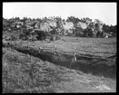 Skioptikonbild från institutionen för fotografi vid Kungliga Tekniska Högskolan. Motiv föreställande gärdsgård. Bilden är troligen tagen av John Hertzberg.