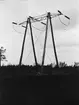 Ljusbild, spännstolpe av trå å 132 kv- ledning. Knäred- Hässleholm- Malmö, 1930.