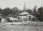 Fahrmanplan med verksraden vid Galärvarvet i bakgrunden. Bakim syns också Nordiska Museet.