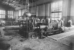 Elektriska maskiner. The foremost part of the large turbines with pipings and governos ready.