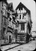 Skioptikonbild med tryckt motiv, vykort med motiv av Rue Saint Romain, Rouen.
Bilden har förvarats i kartong märkt: Resan 1908. Rouen 7. II. Text på bild: 