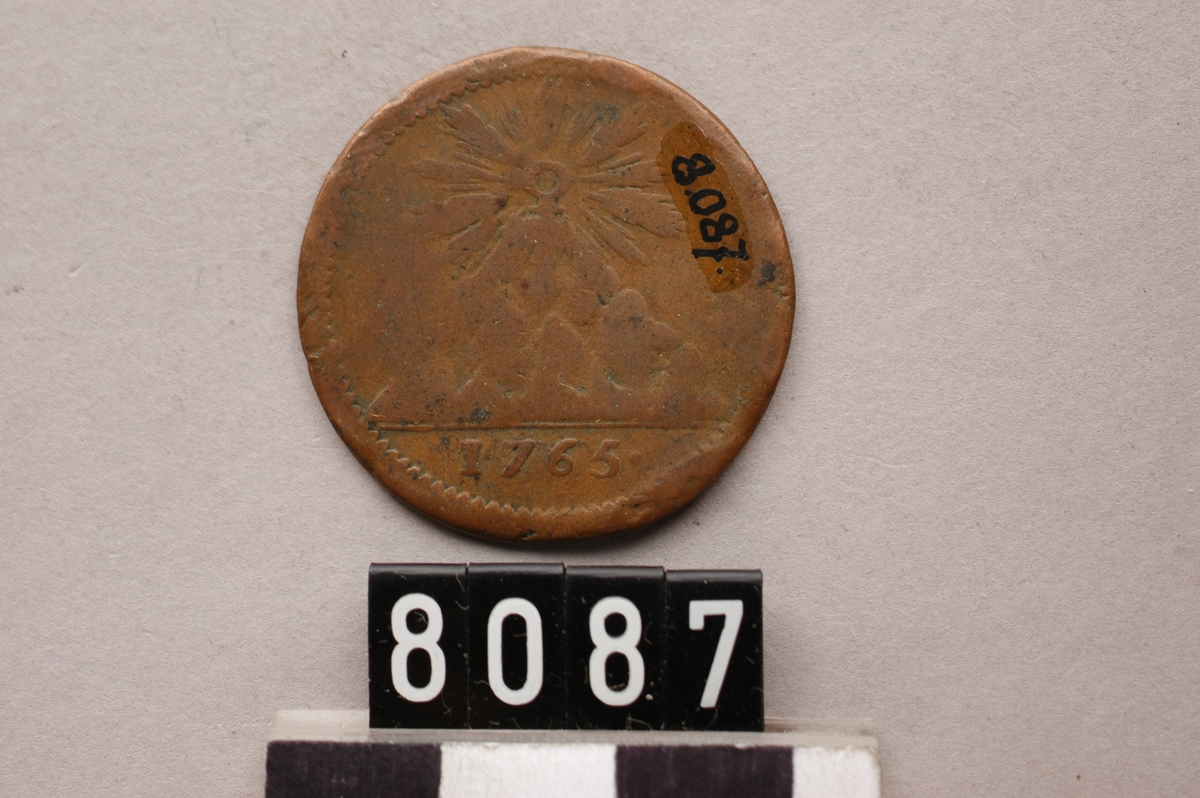 Myntpollett av koppar.