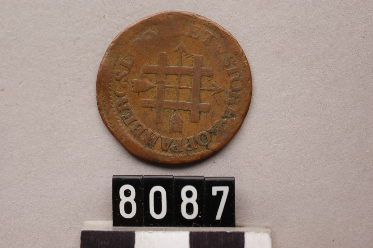 Myntpollett av koppar.