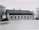 Kv. S:t Sigfrid. Folkskolan. Westerbergsgatan. Gamla slöjdskolan byggd 1905 och bibliotekshuset var placerat på skoltomten vid Westerbergsgatan. Revs 1948 för den nya byggnaden.