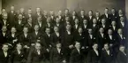 Konfirmandfoto omkring 1926. Prosten Fritz Wetterholm. Nedersta raden från vänster: 1. Ström, 5. Keiling, 6. Evald Nyström, 8. Gösta Åström. Andra raden från vänster: 1. Urban Svensson, 2. Gustav Karlsson, 4. Erland Westergren, 5. Tore Öman, 6. Johannes Andersson, 7. Egon Sandh, 8. Josef Olsson, 9. Reinhold Karlsson, 10. Ragnar Högberg, 11. Knut Claesson. Tredje raden från vänster: 1. Gustav Rosblad/Rosbald?, 2. Elof Pallman, 3. Gustav Karlsson, 4. Bo Bergman, 7. Karl-Axel Karlsson, 8. Allan Zetterberg, 9. Gunnar Karlsson, 11. Lundin, 12. Nils Ekström, 13. Bertil Brodén. Översta raden från vänster: 1. Lunddahl, 2. Frimansson, 3. Åke Andersson, 5. Helge Melén, 6. Valter Magnusson, 7. Olle Brolin, 8. Sven Hillerström, 9. Torsten Johansson, 10. Allan Arvidsson, 11. Olle Nilsson, 12. Gustav Svensson, 14. Kjell Bergman, 15. Bertil Wallin.