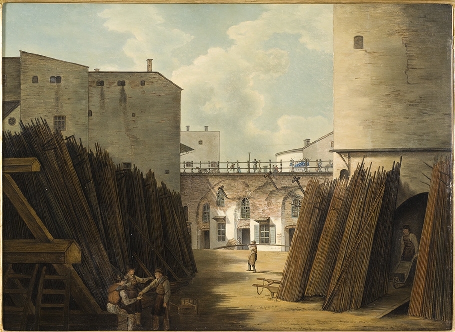 Målningen föreställer sannolikt ett stycke av järnvågen vid slussen i Stockholm. På flera platser i bildens rum pågår aktiviteter av olika slag. I förgrunden står tre män stilla tillsammans. Ur byggnaden till höger i bilden kommer en man med skottkärra. Över planen går en man som bär på några järnstänger. Gatuliv i form av en grupp marscherande soldater.