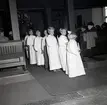 En procession i samband med att kyrkvaktmästare Gustav Svensson avgick den 1 november 1958.