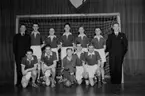 BK Dixies handbollslag mars 1941, bakre raden femte från vänster är Sven Regnell. Spelaren stående längst till höger är Hans Nehlin. 15215.