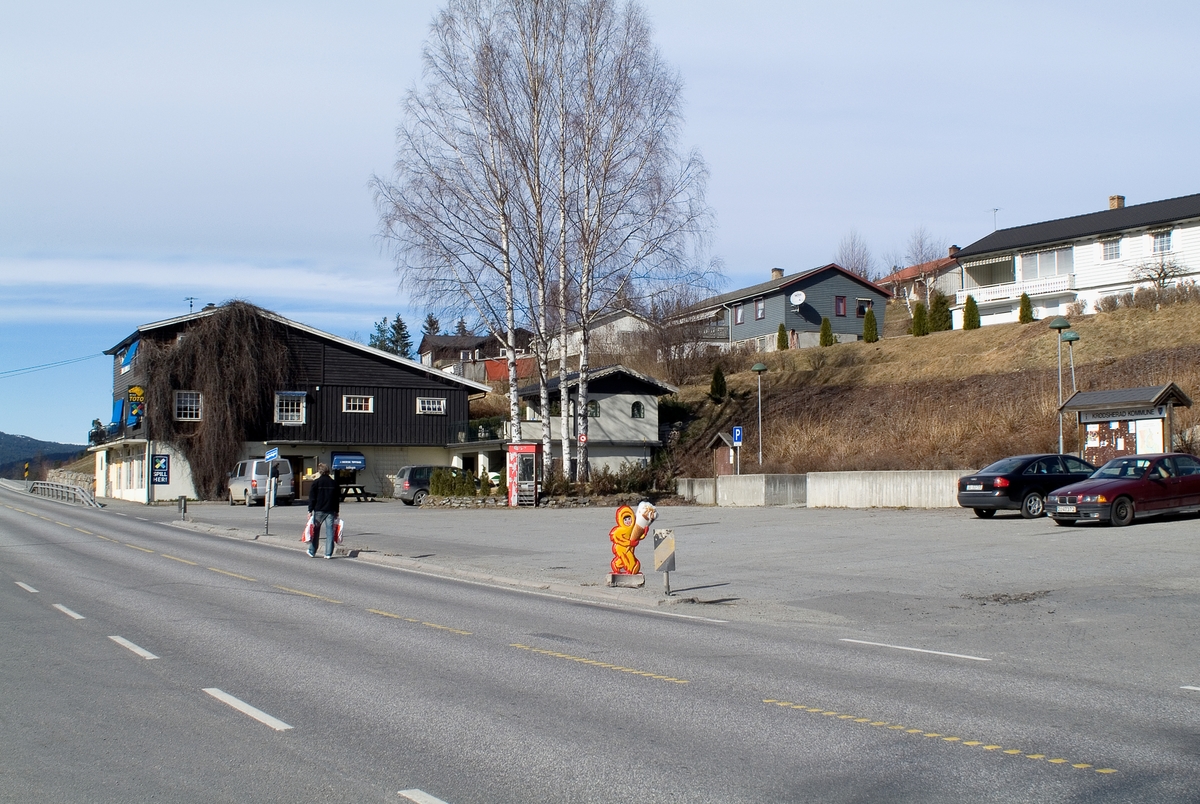 This is the story of how Norway’s most important conversation-space was designed by a young, freshly graduated man from Bergen.

“Norwegian architects are hereby invited…”
In the autumn of 1932, Oslo Telefonanlegginitiated an architectural competition. Finally, Oslo would get its own telephone booth. The city had had so called “talking-stations” from 1885, which in turn were overtaken by automatic telephones 
 only available at selected Narvesen kiosks. The state 
was of the opinion that now was the time to offer the public a better service; public telephone booths open 24/7, like the ones they already had in Sweden and England. But what would they look like, these new telephone booths? What considerations would it
 be necessary to take when designing it? The telegraph board developed a detailed list of demands and restraints: “The booth is intended to be placed outside on the streets and squares and need to be designed so that snow and ice does not hinder the opening and closing of the doors,” they wrote. “To prevent vandalism, theft, uncleanliness etc. inside the booth, it needs to be designed so that from all angles one may see what is going on in there.” Additionally, it would need to withstand storms and bad weather, and “preferably also being whipped by rain mixed with seawater” 

This was not all: The appearance would have to be «pleasing». The booth also needed to be movable, so that it could be taken in to be serviced at Telegrafverket’s main workshops. The reqired material was iron, and the surface was to be spray painted  preferably using car-body paint. There was a requirement for “a writing shelf, a pack shelf, and a suitable place for the telephone catalogue.” Also, there would need to be an illuminated TELEFON  sign, easily visible from all four angles. The total cost for each booth should not exceed 1000 kroner. The first prize for coming up with such a product was 800 kroner.

“Norwegianarchitects are hereby invited to partake in a competition for the design of a telephone booth…”  

The man with the solution
«At some point in 1932, Georg Fredrik sat at a party in Bergen. Maybe he felt a bit lost and forgotten as he often had throughout his life. He retreated to a quiet corner, took out a pencil and strted doodling on a matchbox.  According to my mother, this was how the telephone booth came into being.” In the book “Norges lille røde  historien om telefonkiosken,” Lars Fasting describes his father, the man who is far less known than the iconic architctural structure he left behind. Georg Fredrik Fasting was from Bergen, born into a family of working people and smallholders. One unusual facet of Georg Fredrik was that he was born without ears. His mother made sure he learnt to speak, read and write, 
ut Lars Fasting indicates that his father would seek refuge in drawing when the social challenges became too much to bear. And in the end drawing became his profession. In 1924 he secured a guarantor for a student loan, and started studying to become an a
rchitect at the NTH. Throughout the 1930s he entered several architectural competitions, with drafts produced, according to his son, “after work and in the late hours of the night.”

His efforts were not wasted. Out of 93 entries, with names such as “Flirt”, “Brrr”, “Ring” and “Amor”, the jury selected Fasting’s submission, “RIKS” as the new telephone booth: “The draft shows a strikingly simple solution to the task, technically as well as aesthetically well worked out.”

Taut and provident
Simple and aesthetc are the keywords here. Fasting had designed a booth pointing towards the future, and to modernism. Just how modern it was can be seen by comparing RIKS to the British telephone booth, also designed in the interwar-era. While the British version with it classicistic style is looking back to the heyday of the empire, Fasting’s booth is progressive and functionalistic. Like most Norwegian architects, Fasting broke with the classicistic style of architecture after the Stockholm-exhibition in 1930. “After it, almost all buildings erected in Norway until the German invasion in 1940, were in the functionalistic architectural style,” writes senior curator of architecture at the Norwegian National Museum, Ulf Grønvold, in the book, “Den lille røde”.“TheNorwegian booth is a piece of functionalistic architecture, an asymmetric composition with its roof slab overhanging the word TELEFON, in bold sans seraph lettering,”concludes Ulf Grønvold.

Fashionably red
And it was red. Fasting chose a colour which was part of the modern palette. “A bright red colour, but not as shiny as a signal red, the character of the colour places it among the fashionable colours within functionalism,” states paintings conservator and researcher in NIKU (Norwegian Institute for Cultural Heitage Research), Jon Brænne. In his opinion, Fasting went for visibility without making the booth stand out too much from its surroundings. The original colour was in use up to around 1950, when it changed to signal red. Towards the end of the 1970s the clour was again adjusted towards today’s orangey red.

The design, however, has not changed. RIKS is eighty years and still looks remarkably good. That’s what makes Fasting’s telephone booth a classic  even before it was added to DOCOMOMO’s list over moden icons of design. For Telenor, the telephone booth has served as a pathway into the hearts of the public. For many, Telenor (Televerket) was synonymous with exactly this telephone booth, because this was where one would go to place a call. Having a home
phone was not common until the 1980s. As such the red box became part of the Norwegian everyday and consciousness. The symbol- and publicity value of this is hard to evaluate, but in 2007 it was time to give honour where honour was due, Telenor, in consul
tation with the Directorate for Cultural Heritage, decided to preserve 100 telephone booths for all eternity.

And what about Georg Fredrik Fasting? What happened to him? At the age of 56 an entry in his diary states: «I CAN HEAR». As the first person in th world he had undergone an operation where he had ear canals constructed and eardrums fitted. For the rest of his life, the man behind Norway’s own telephone booth could answer the telephone himself.

Source: Norges lille røde historien om telefonkiosken (2007), issued by The Norwegian Telecom Museum and Telenor Cultural Heritage.