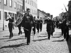 Jubileum 50 års, A 6. Musikkåren, på väg genom staden.