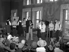 Folkskolans 100års-jubileum firas i Herrhagsskolans aula 1942.