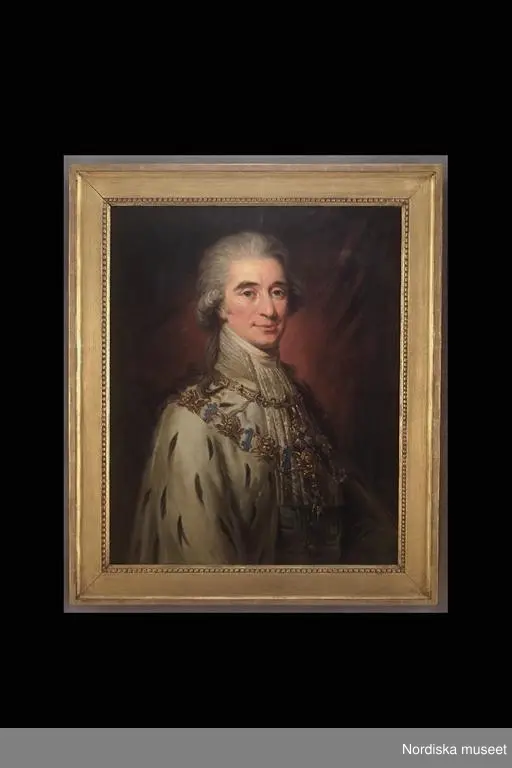 Huvudliggaren:
"Axel von Fersen 1755-1815, olja på duk, kopia efter original i Uppsala Universitets samlingar av Breda. Ram av furu, krederad och förgylld. h 98,5 cm."