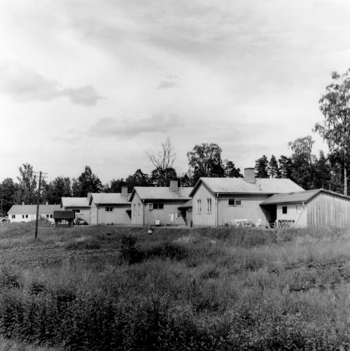 Någonstans i Värmland - från slutet av 1950-talet: Persberg. Lämna gärna en kommentar om du vet något om bilden.